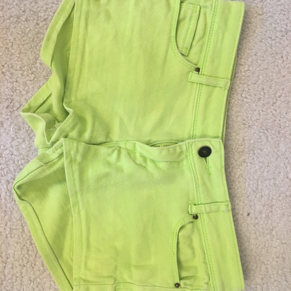 Neon green jean shorts